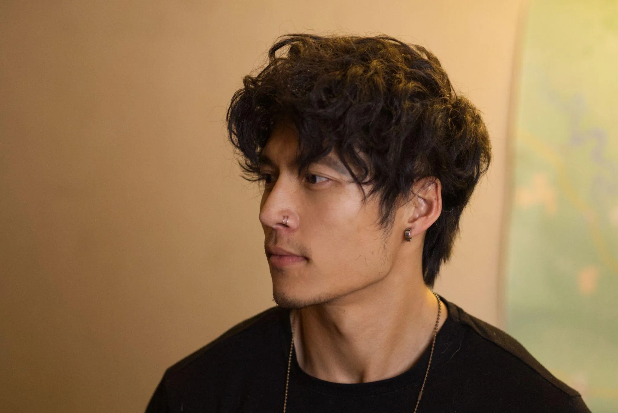 BenjaminFCC with styled hair, jewelry, and lean physique