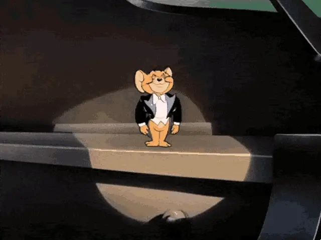 Tuxedo Jerry from Tom and Jerry, standing dapper in a spotlight